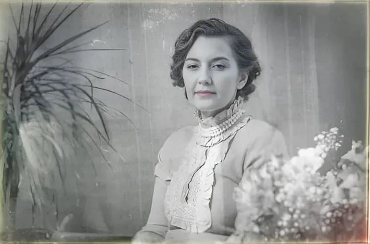 Scratched old family photo before AI restoration with RestorePhotosApp