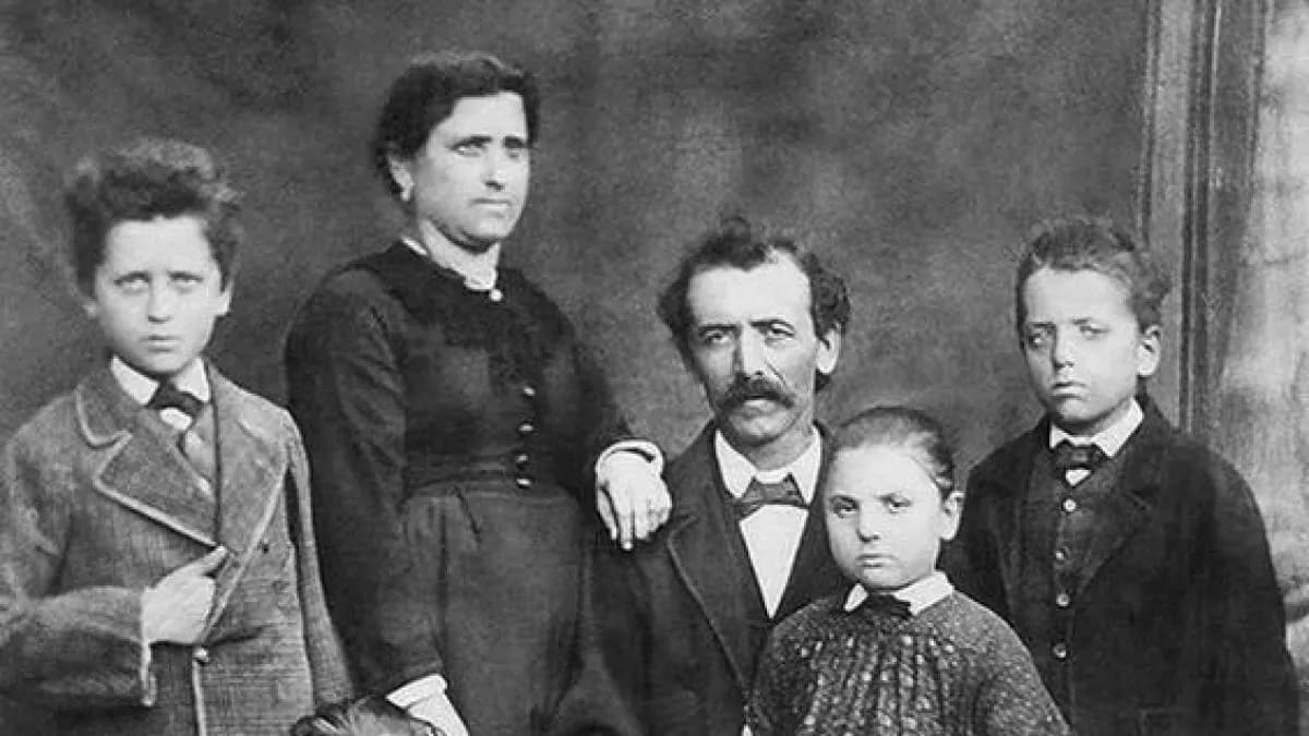Black and white old family photo before AI restoration and colorization with RestorePhotosApp