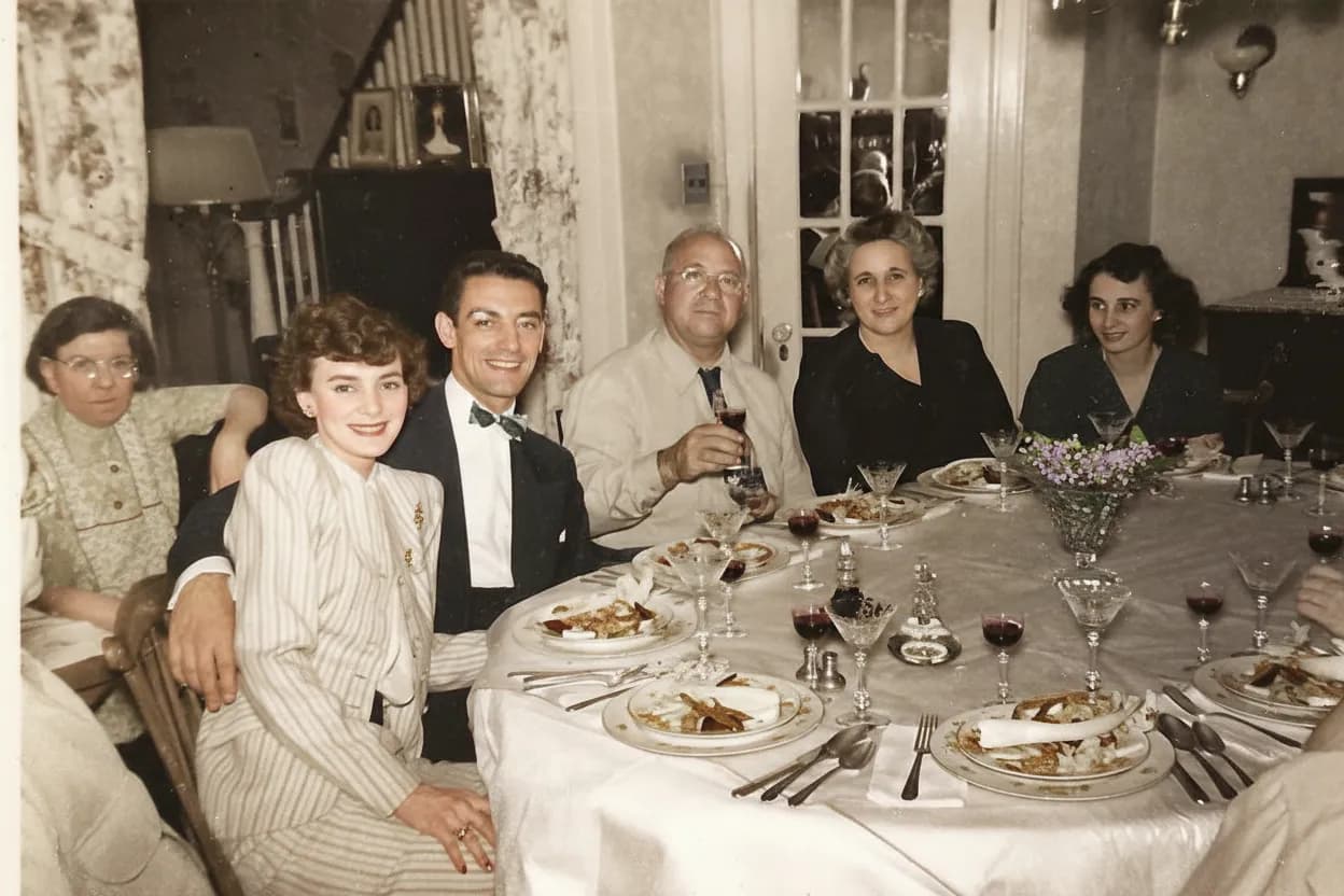 Same family group photo restored by RestorePhotosApp AI with sharper faces and recovered detail