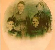 Faded and damaged family photo before AI restoration with RestorePhotosApp